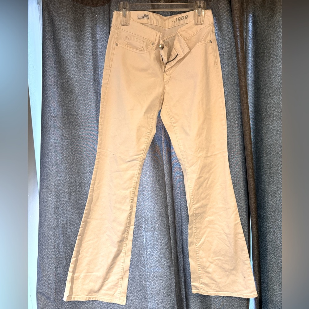 New white bootcut jeans